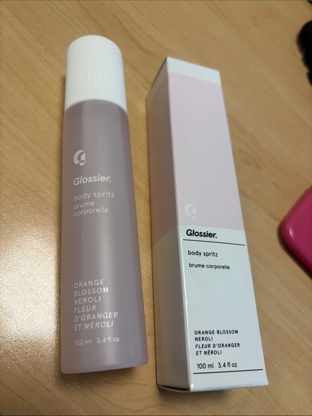 Glossier Light Pink Body Spray orange blossom neroli sprayed a few times